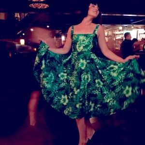 1950’s empire-waisted sleeveless dress.